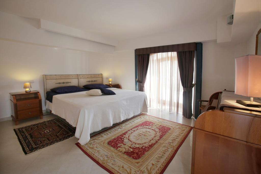 Апартаменты Casa Costa Таормина Номер фото